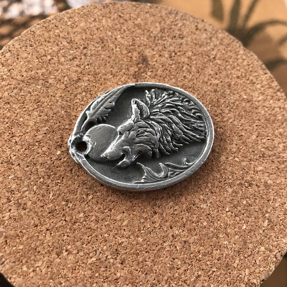 Wolf pendant with poem